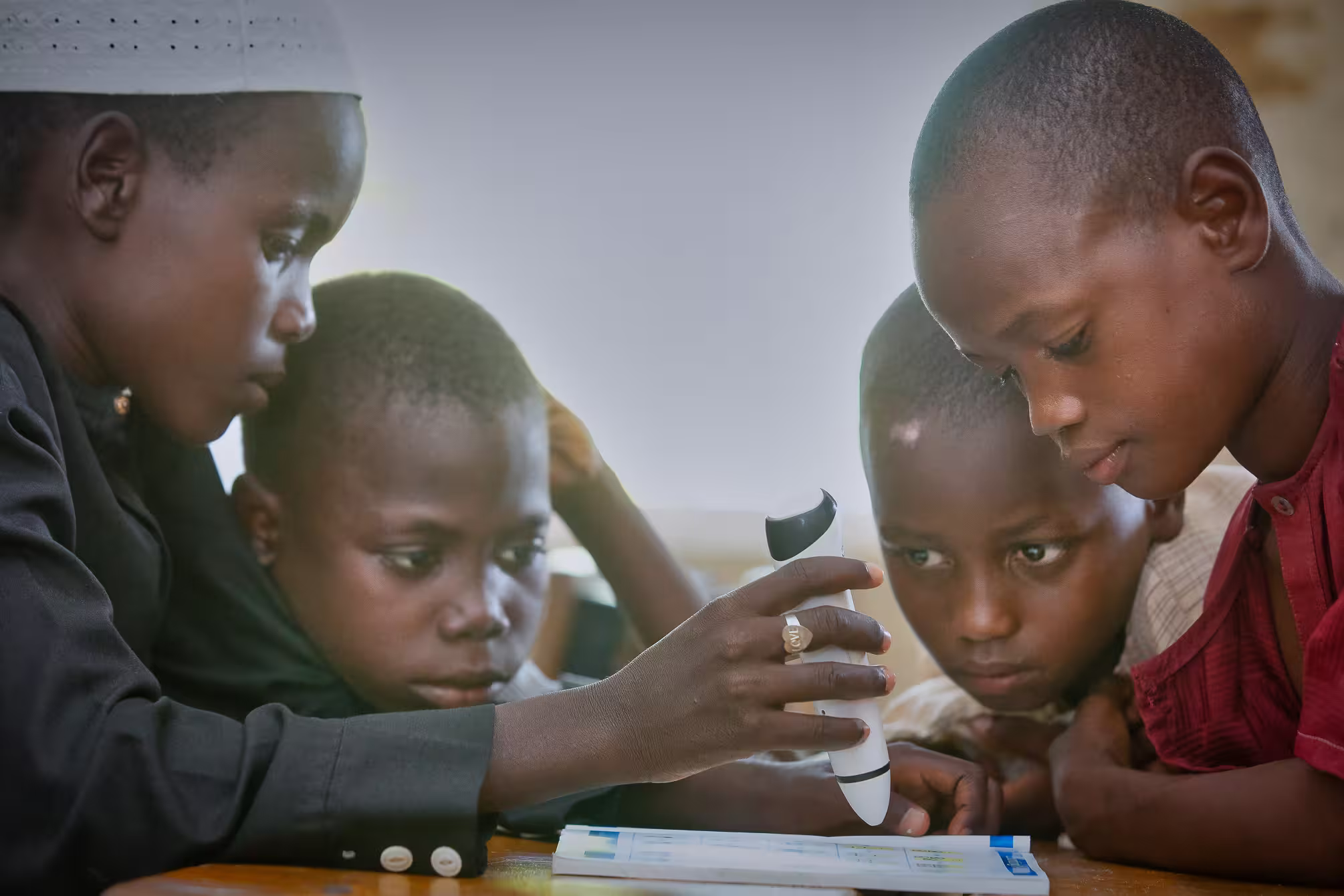 Child reading with talking books